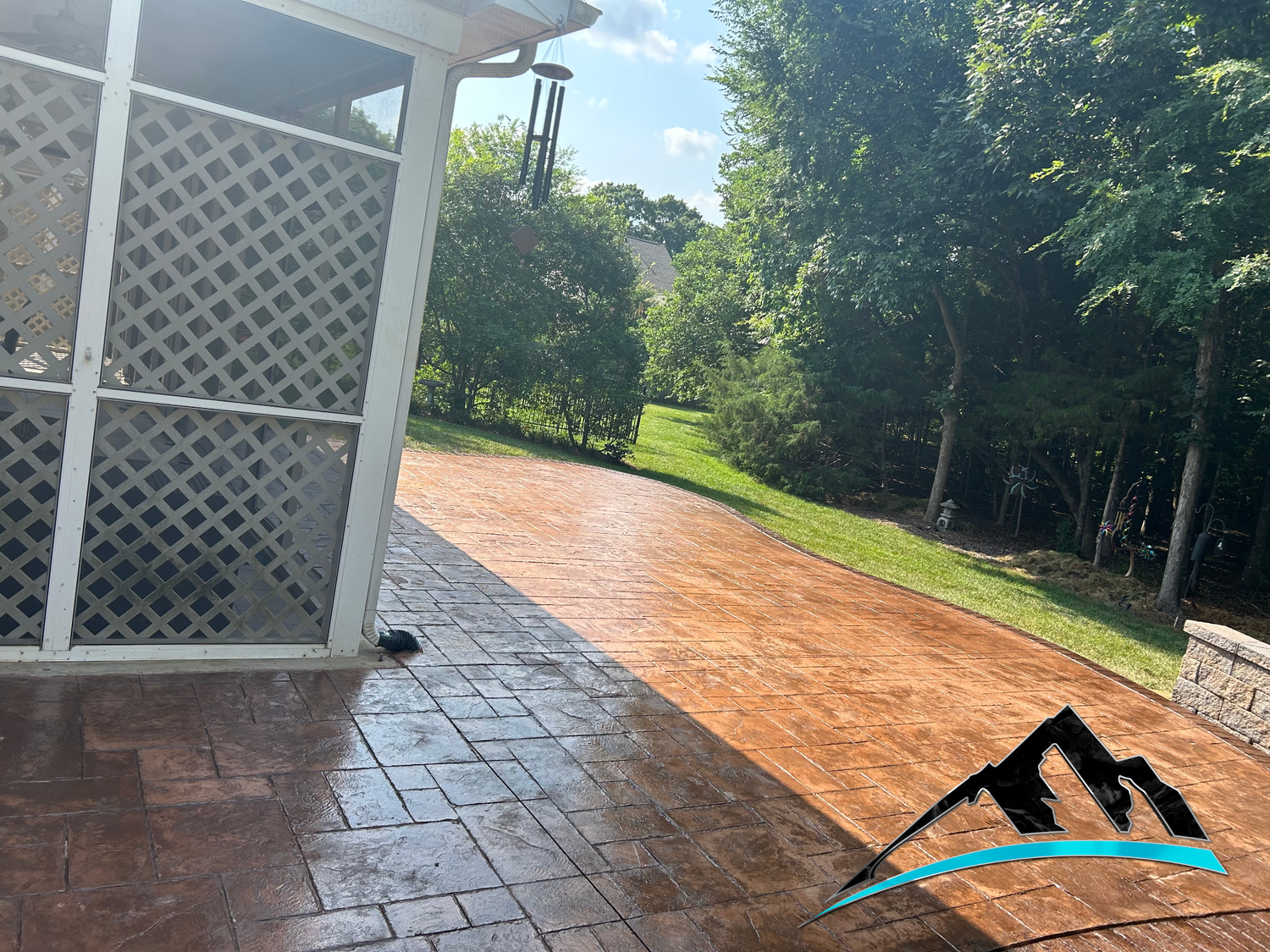 Liquid Rock project: Colored stamped patio, wide view